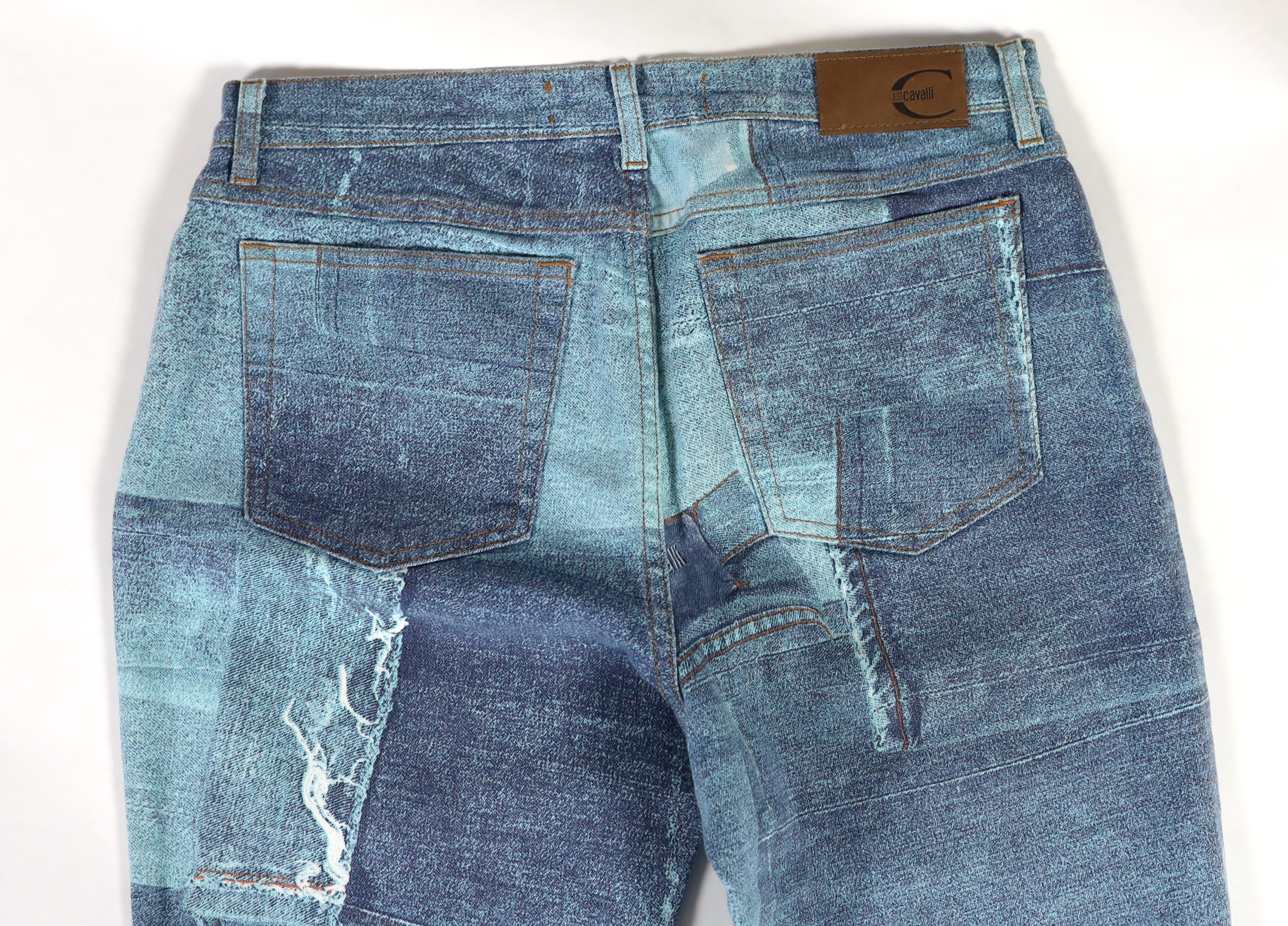 Two pairs of Just Cavalli lady's jeans, size EU 46